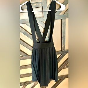 Pleated skirt with shoulder straps